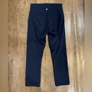 Navy blue lululemon cropped leggings.